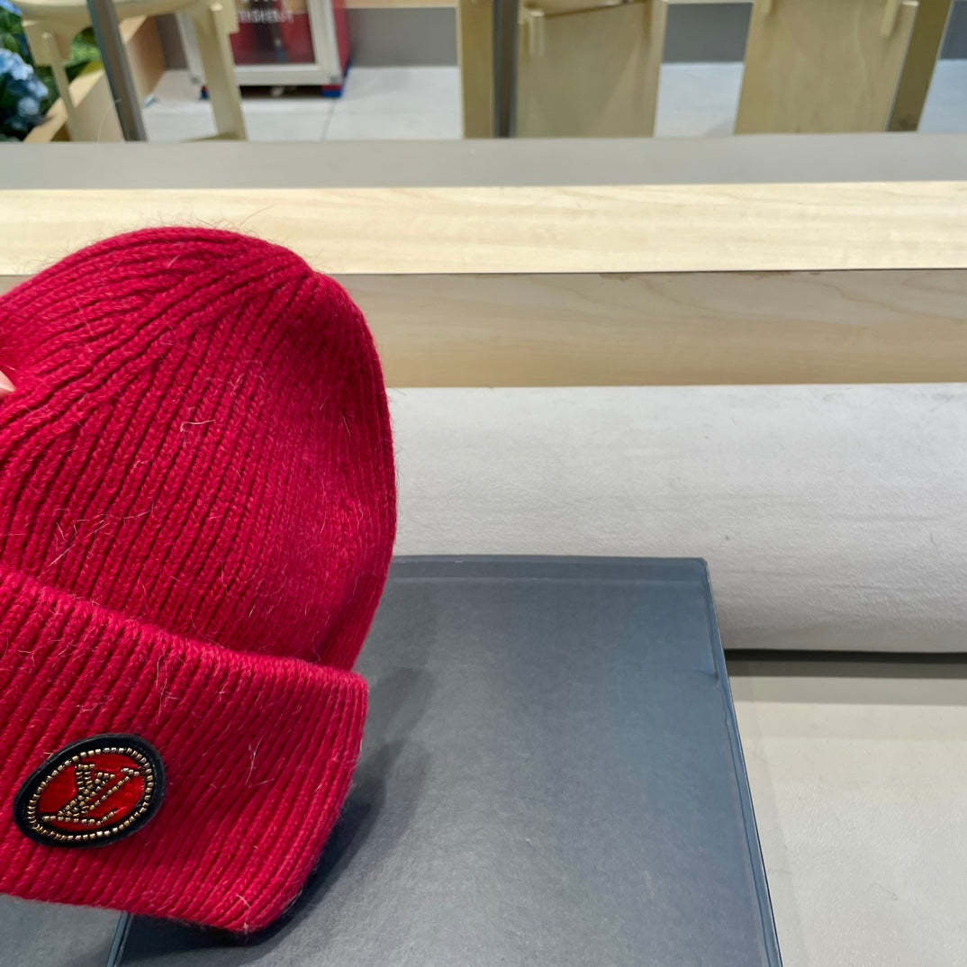 BONNET EN LAINE ROUGE ET FOURRURE DE LAPIN 433476 