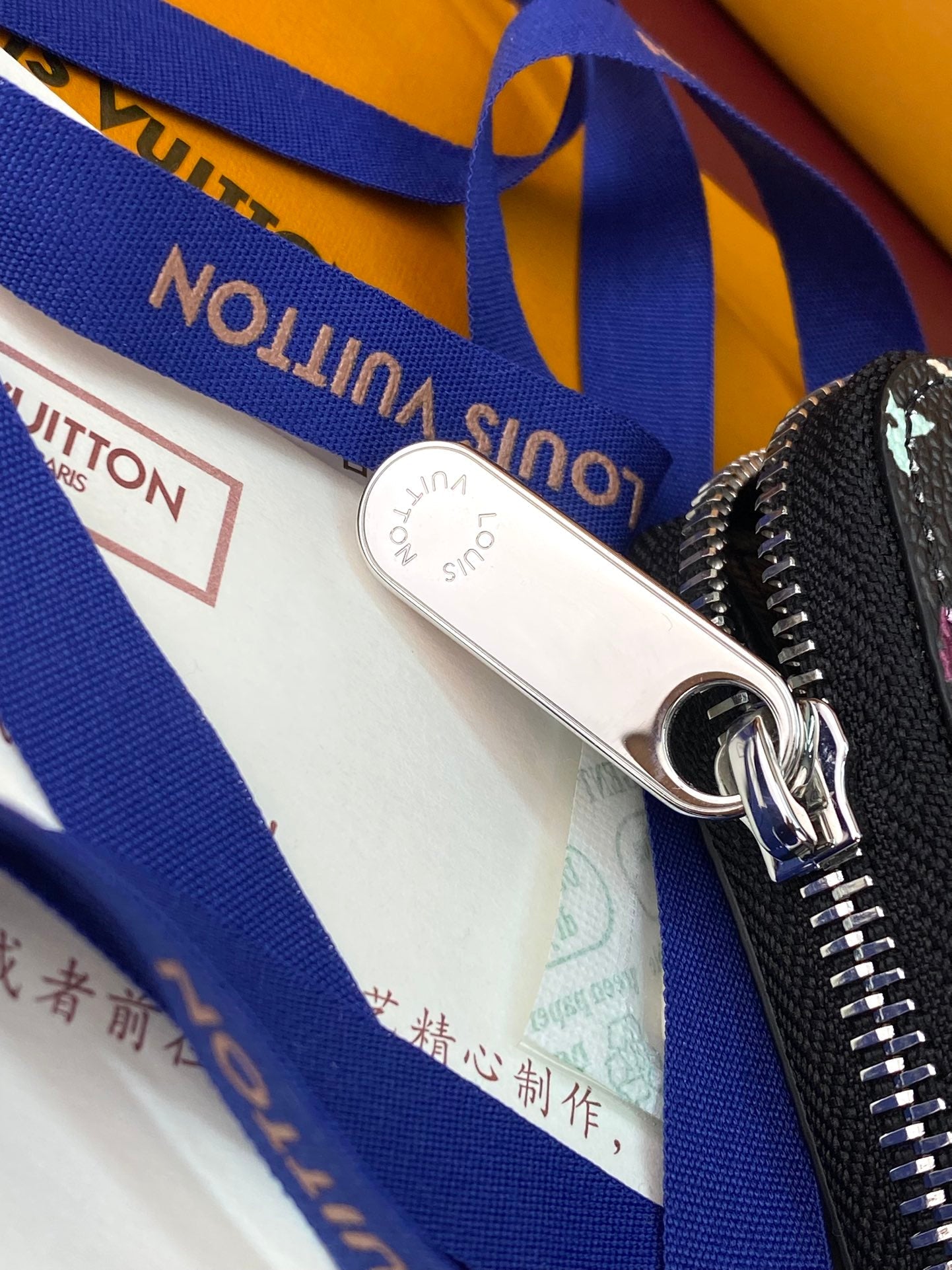 Portefeuille zippé LV x TM en toile monogrammée noire et multicolore