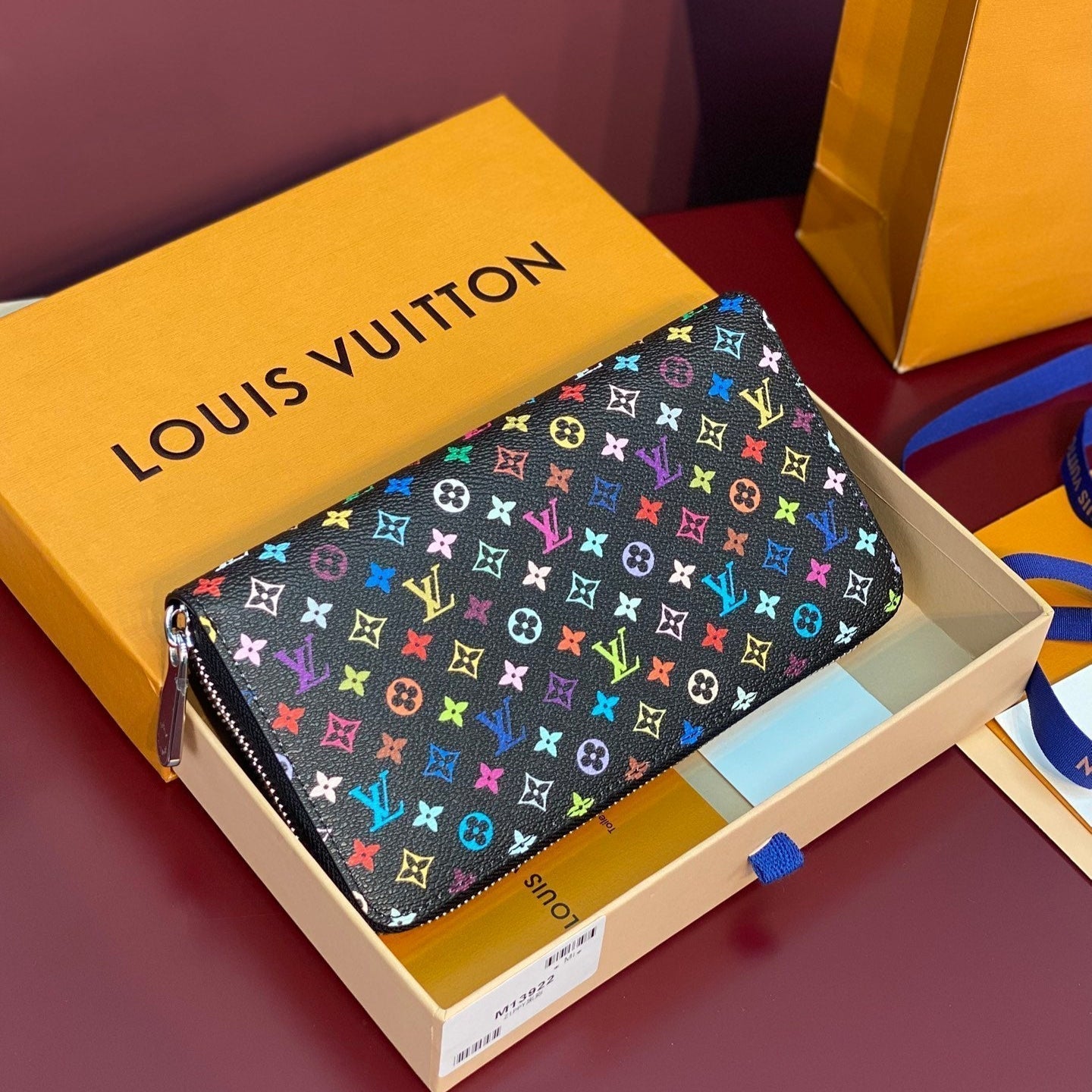 Portefeuille zippé LV x TM en toile monogrammée noire et multicolore