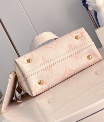 Sac fourre-tout PM 29 en cuir de vachette grainé rose clair avec monogramme 