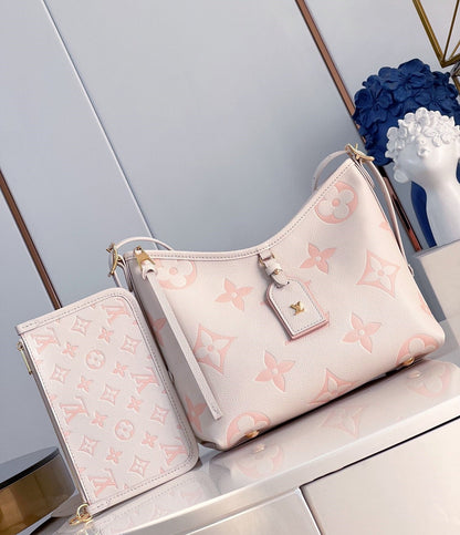 Sac fourre-tout PM 29 en cuir de vachette grainé rose clair avec monogramme 