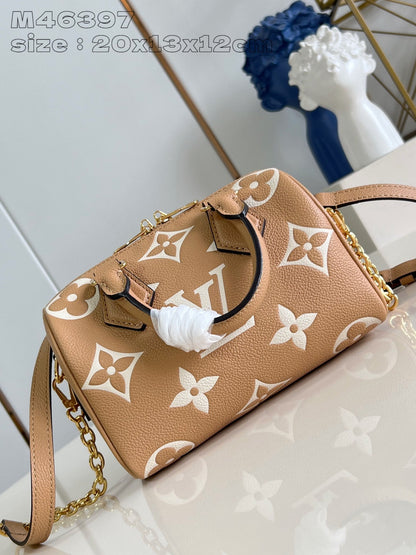 Speedy Bandouliere 20 Cuir de veau Empreinte Monogram Marron Blanc 