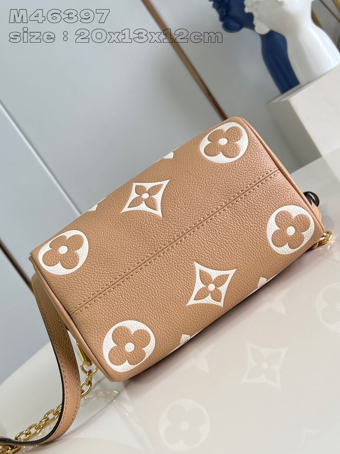 Speedy Bandouliere 20 Cuir de veau Empreinte Monogram Marron Blanc 