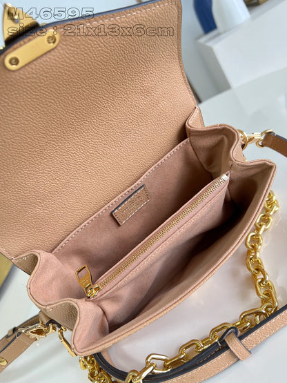 Pochette Metis East West 21,5 en cuir de veau monogrammé marron et blanc
