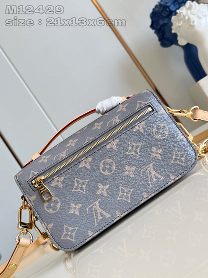 Pochette Metis East West 21,5 en toile monogrammée grise