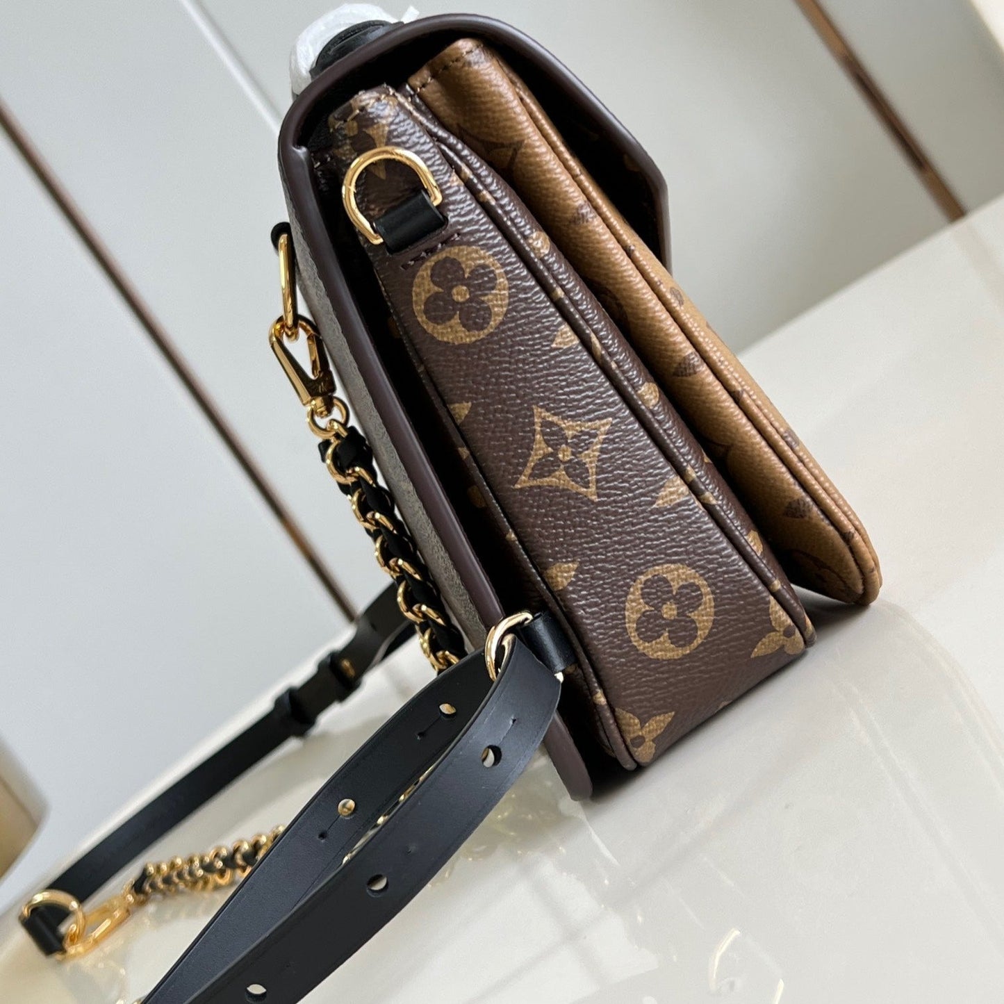 POCHETTE MÉTIS 20 EN TOILE MONOGRAMME MARRON ET MONOGRAMME REVERS BOUCLE DORÉ