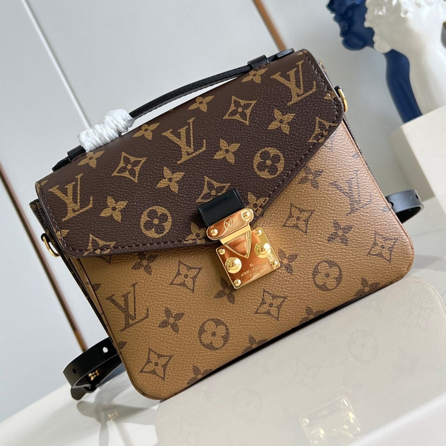 POCHETTE MÉTIS 20 EN TOILE MONOGRAMME MARRON ET MONOGRAMME REVERS BOUCLE DORÉ