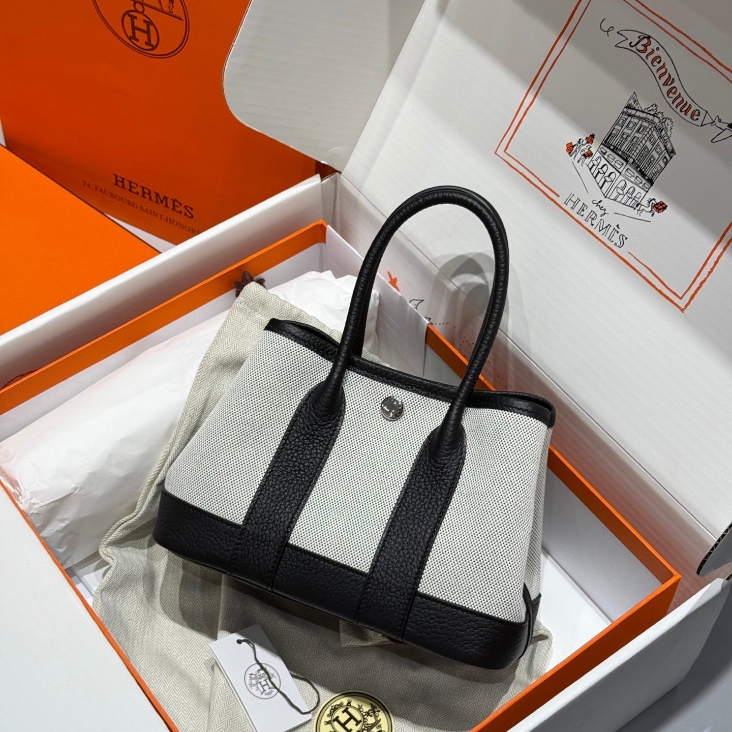 Sac HM Neo Garden 23 en toile blanche et cuir de veau Negonda 243325