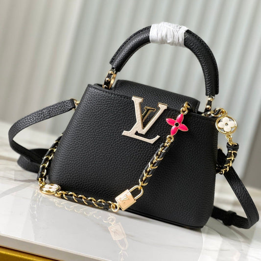 capucines mini 21 cuir taurillon noir et accessoires dorés