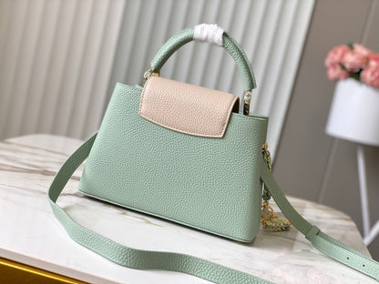 capucines bb 27 green beige taurillon leather gold hardware