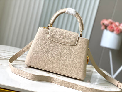 CAPUCINES BB 27CM CUIR TAURILLON BEIGE
