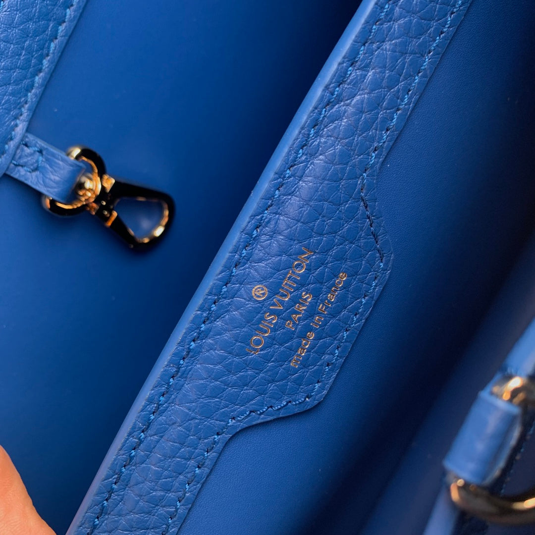 capucines mm 31,5 cuir de taurillon bleu cobalt accastillage doré