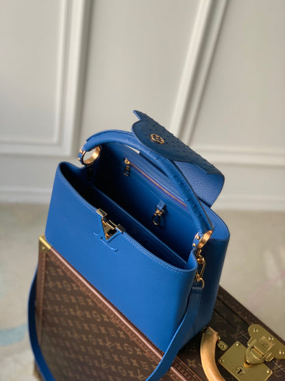 capucines mm 31,5 cuir de taurillon bleu cobalt accastillage doré