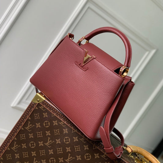 capucines mm 31,5 cuir taurillon bordeaux accastillage doré
