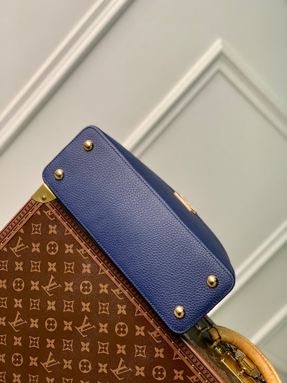 capucines mm 31,5 cuir taurillon bleu foncé accastillage doré