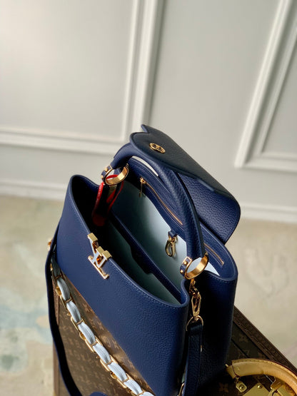capucines mm 31,5 cuir taurillon bleu foncé accastillage doré