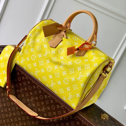 Speedy P9 Bandouliere 40 cm en cuir de veau jaune