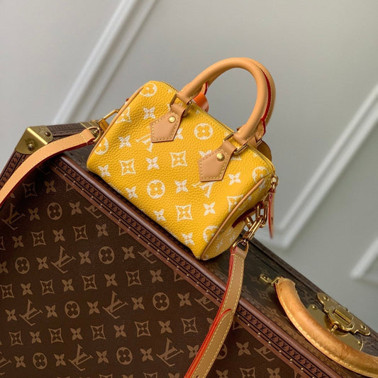Speedy P9 Bandouliere 18 cm en cuir de veau jaune