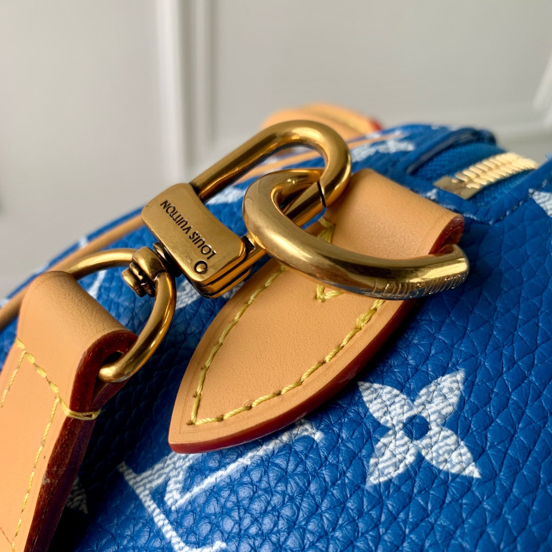 Speedy P9 Bandouliere 18cm en cuir de veau bleu