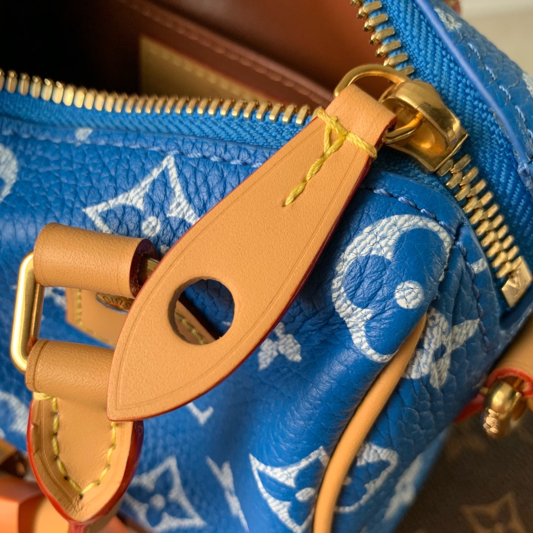 Speedy P9 Bandouliere 18cm en cuir de veau bleu