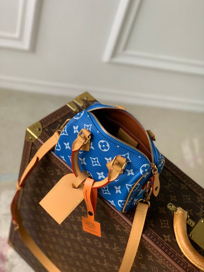 Speedy P9 Bandouliere 18cm en cuir de veau bleu
