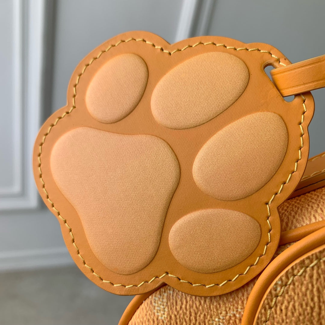 MONTSOURIS MESSENGER PM 20 EN TOILE HÉRITAGE MONOGRAMME ORANGE POIVRE