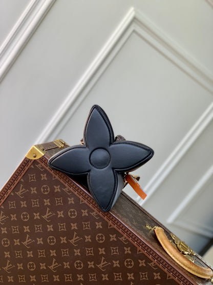 BLOOM PM 21 EN CUIR DE VEAU NOIR ET ACIER DORÉ