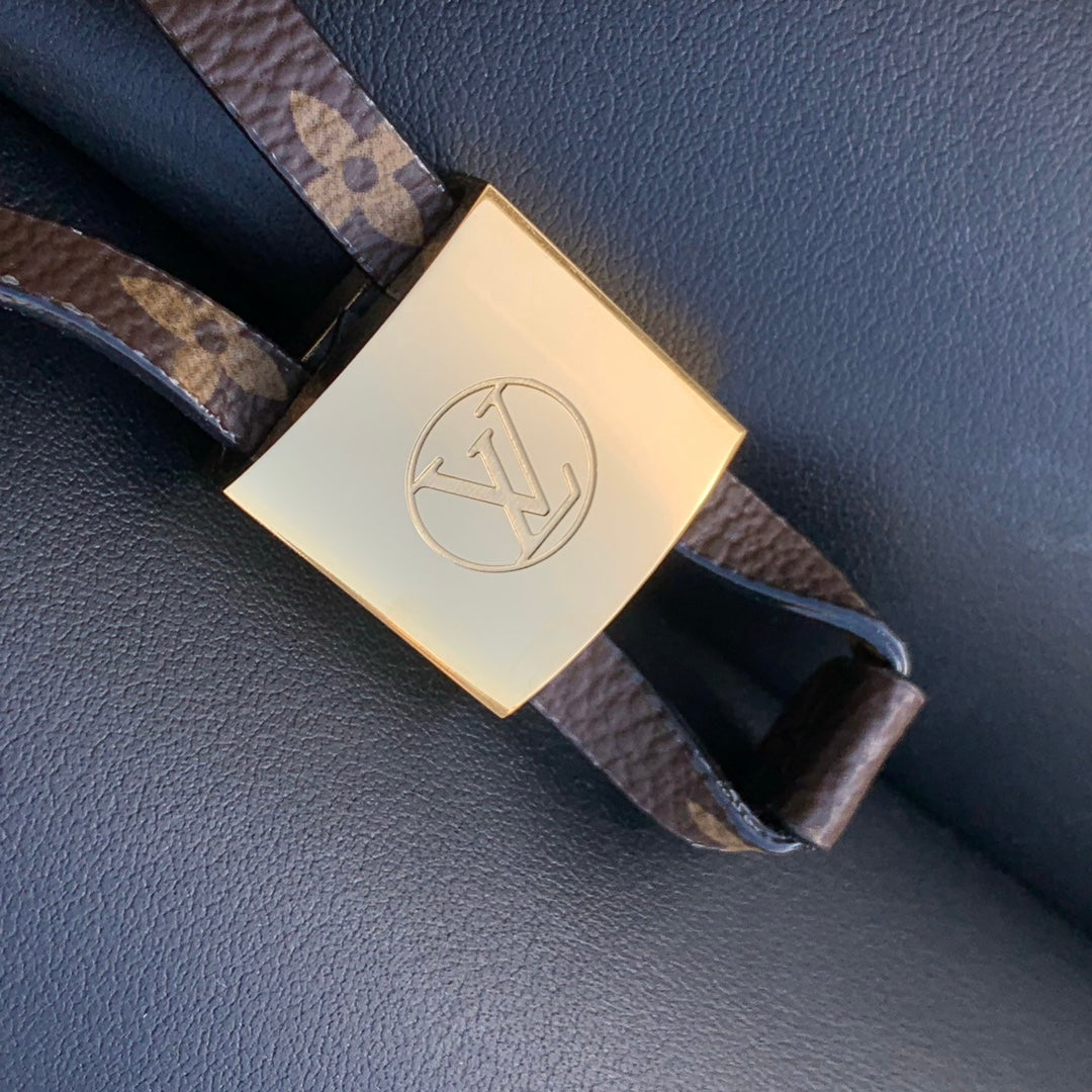 BLOOM PM 21 EN CUIR DE VEAU NOIR ET ACIER DORÉ