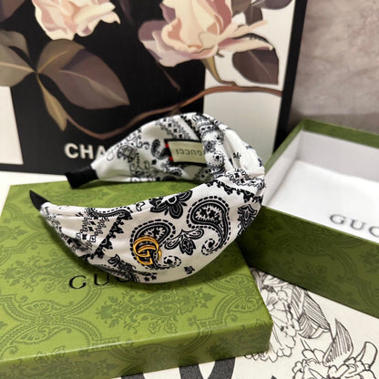 BANDEAU À CHEVEUX EN TISSU À MOTIFS BLANC ET NOIR 299347