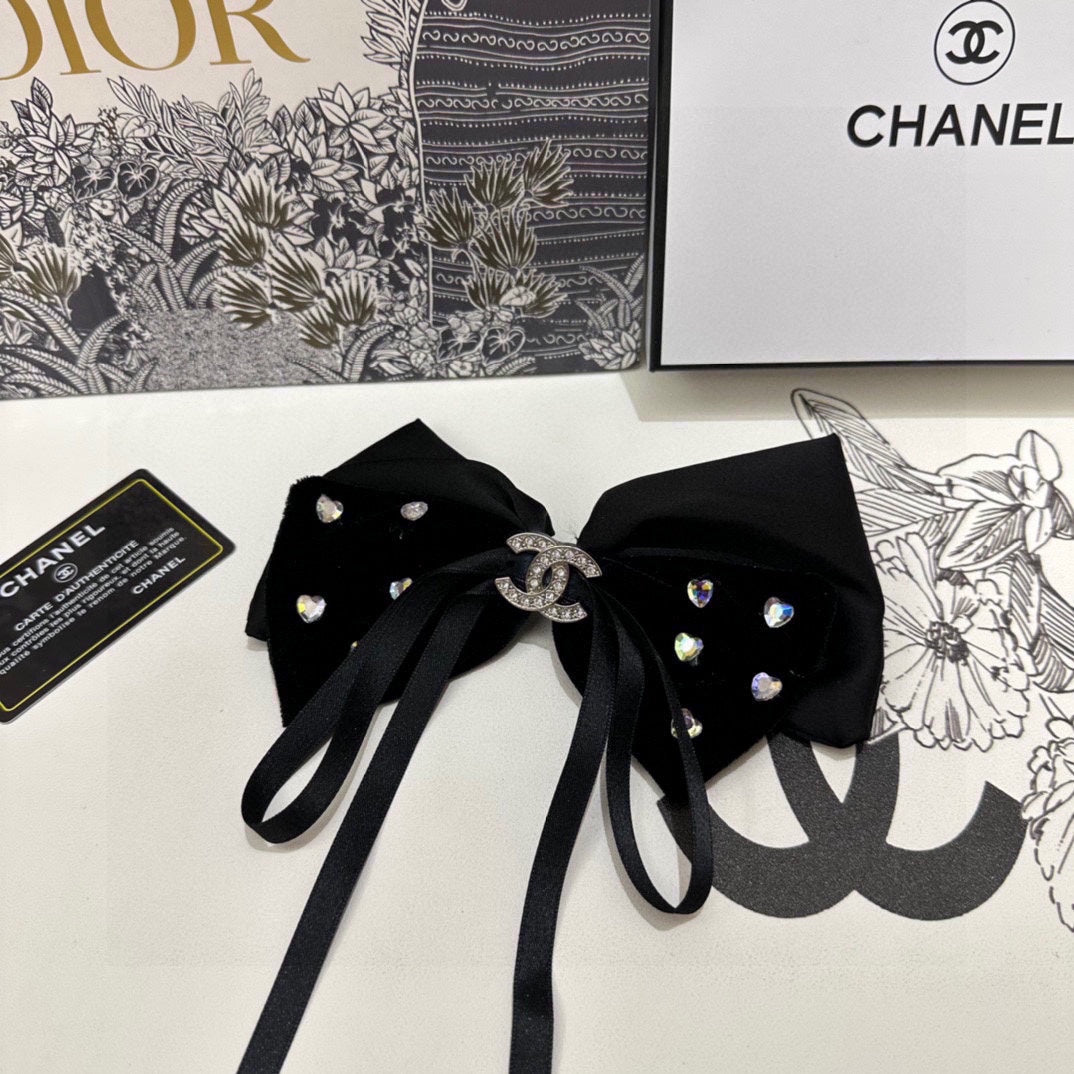 PINCE À CHEVEUX EN VELOURS NOIR AVEC NŒUD ET CRISTAL 412471
