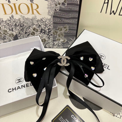 PINCE À CHEVEUX EN VELOURS NOIR AVEC NŒUD ET CRISTAL 412471
