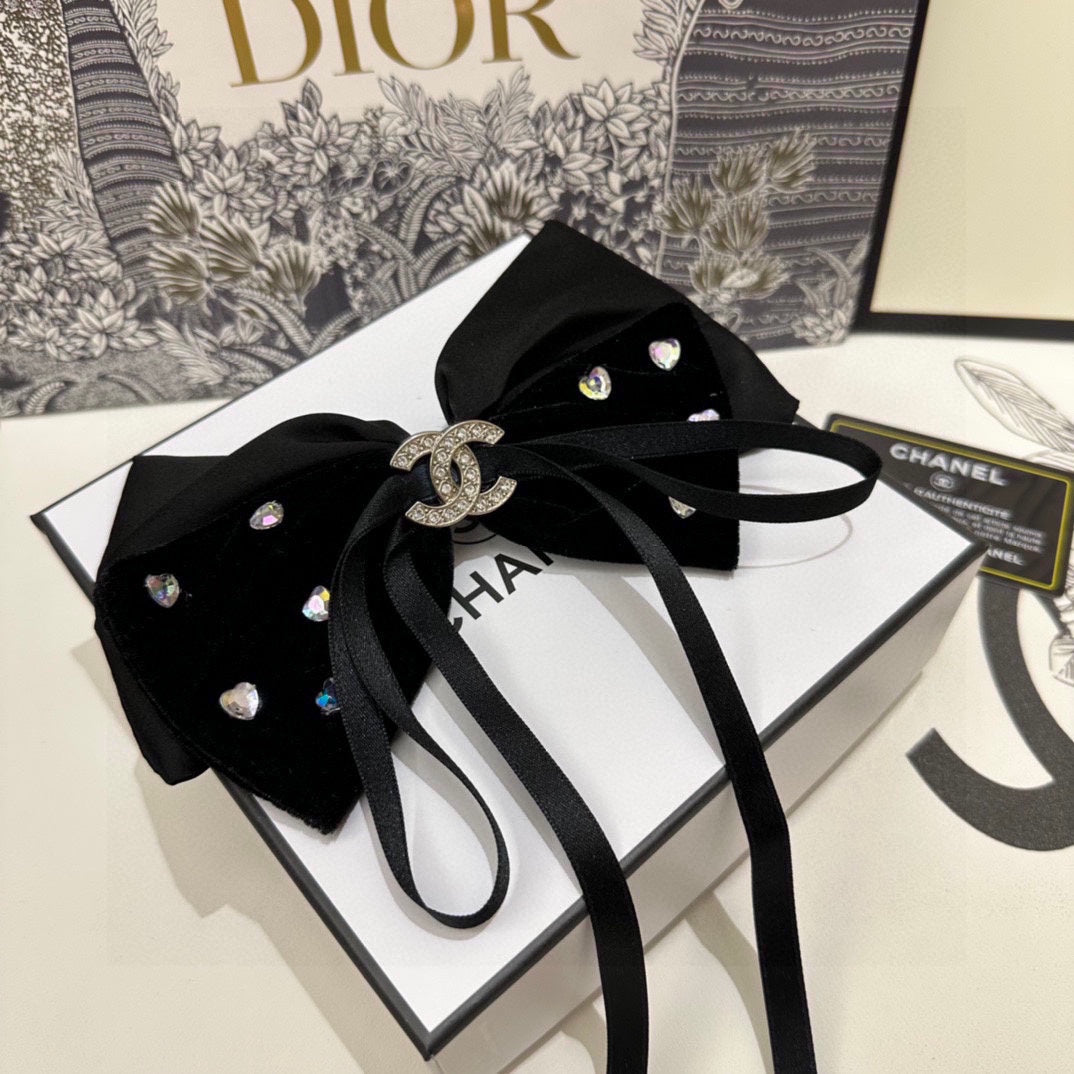 PINCE À CHEVEUX EN VELOURS NOIR AVEC NŒUD ET CRISTAL 412471