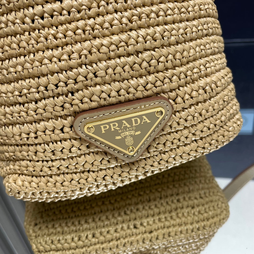 SAC SEAU 20 EN RAPHIA TISSÉ BEIGE LOGO EN RELIEF