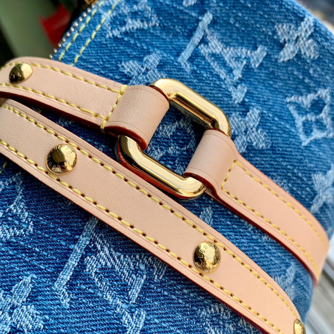 PAPILLON 27 EN DENIM MONOGRAMME BLEU, QUINCAILLERIE DORÉ