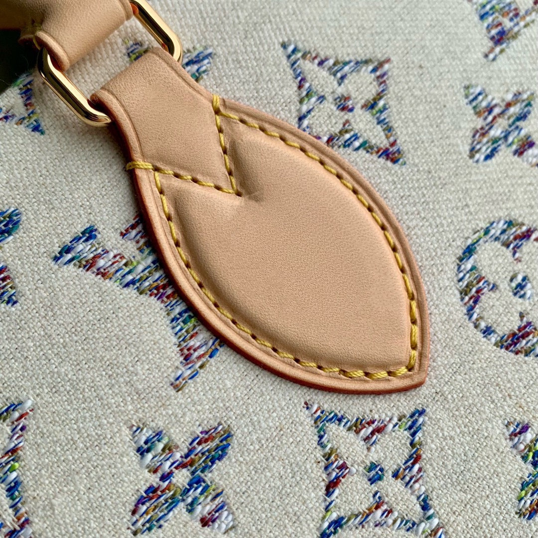 Lv OntheGo MM Cuir beige Tissu jacquard monogramme blanc