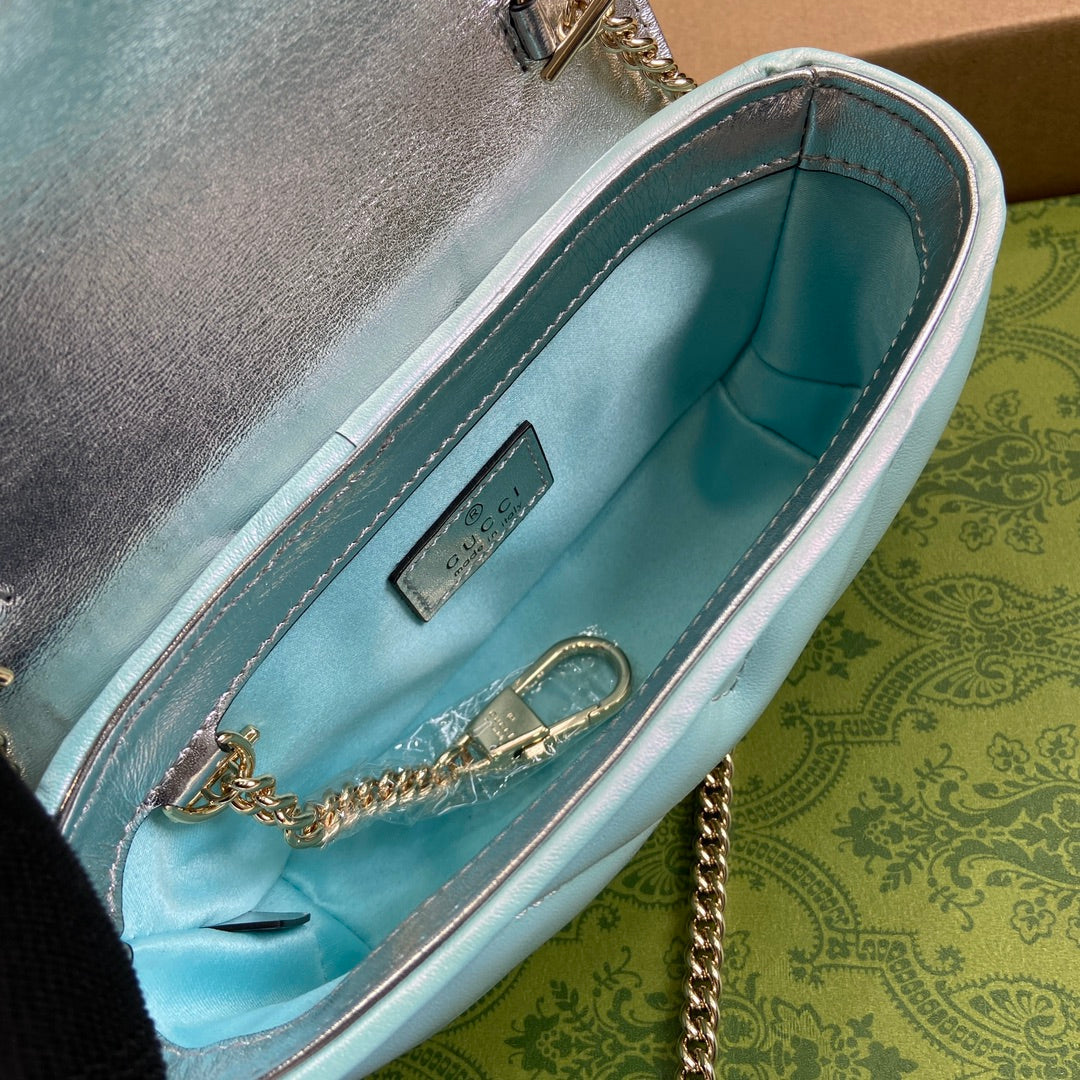 Mini sac bandoulière GG Marmont 16 en cuir de veau irisé bleu