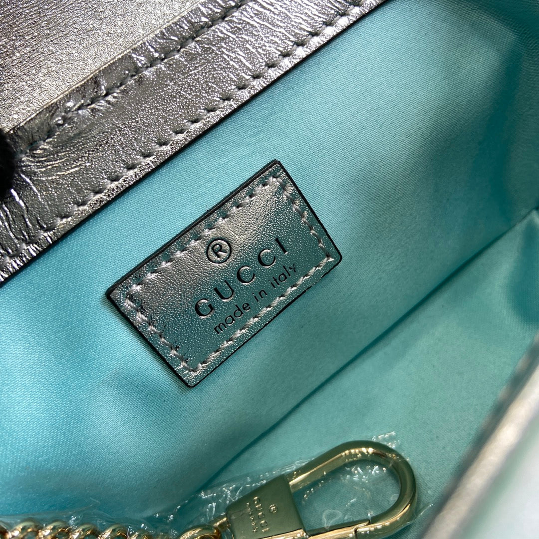 Mini sac bandoulière GG Marmont 16 en cuir de veau irisé bleu