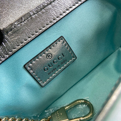 Mini sac bandoulière GG Marmont 16 en cuir de veau irisé bleu