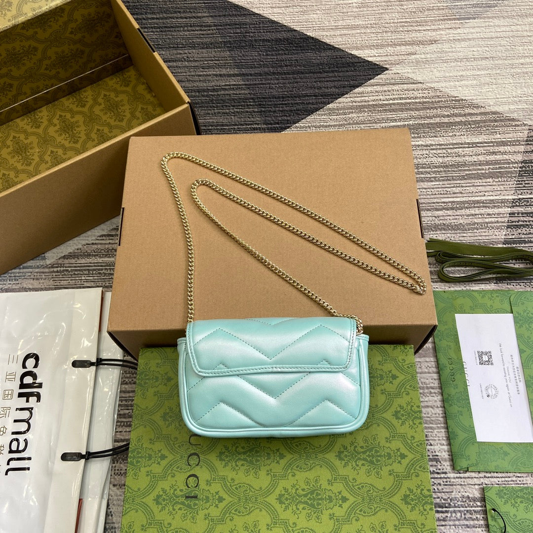 Mini sac bandoulière GG Marmont 16 en cuir de veau irisé bleu