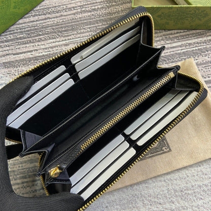 PORTEFEUILLE ZIPPÉ 20 EN CUIR DE VEAU NOIR QUINCAILLERIE DORÉ