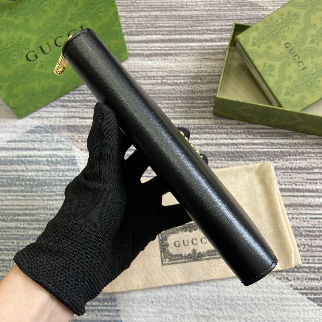PORTEFEUILLE ZIPPÉ 20 EN CUIR DE VEAU NOIR QUINCAILLERIE DORÉ