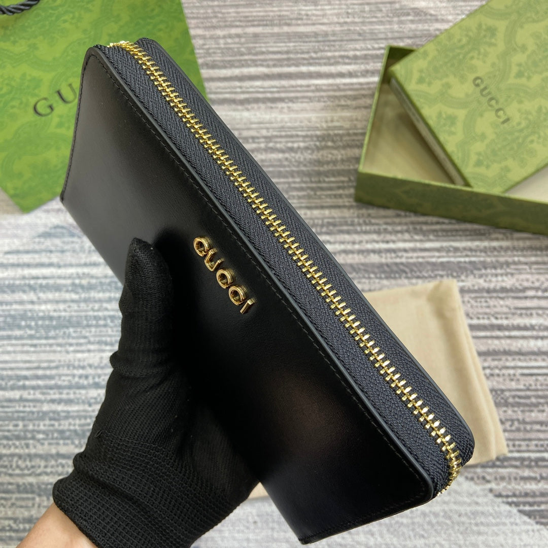 PORTEFEUILLE ZIPPÉ 20 EN CUIR DE VEAU NOIR QUINCAILLERIE DORÉ