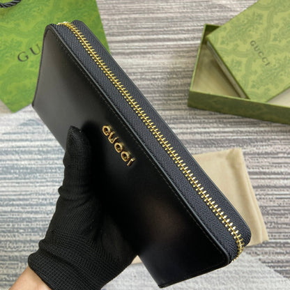 PORTEFEUILLE ZIPPÉ 20 EN CUIR DE VEAU NOIR QUINCAILLERIE DORÉ