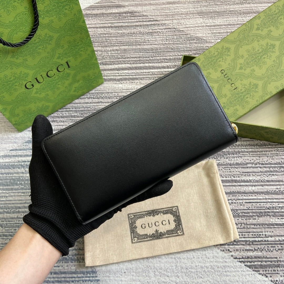 PORTEFEUILLE ZIPPÉ 20 EN CUIR DE VEAU NOIR QUINCAILLERIE DORÉ