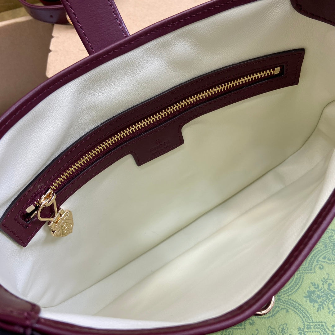 Petit sac bandoulière Jackie 27 en cuir de veau bordeaux et métal doré