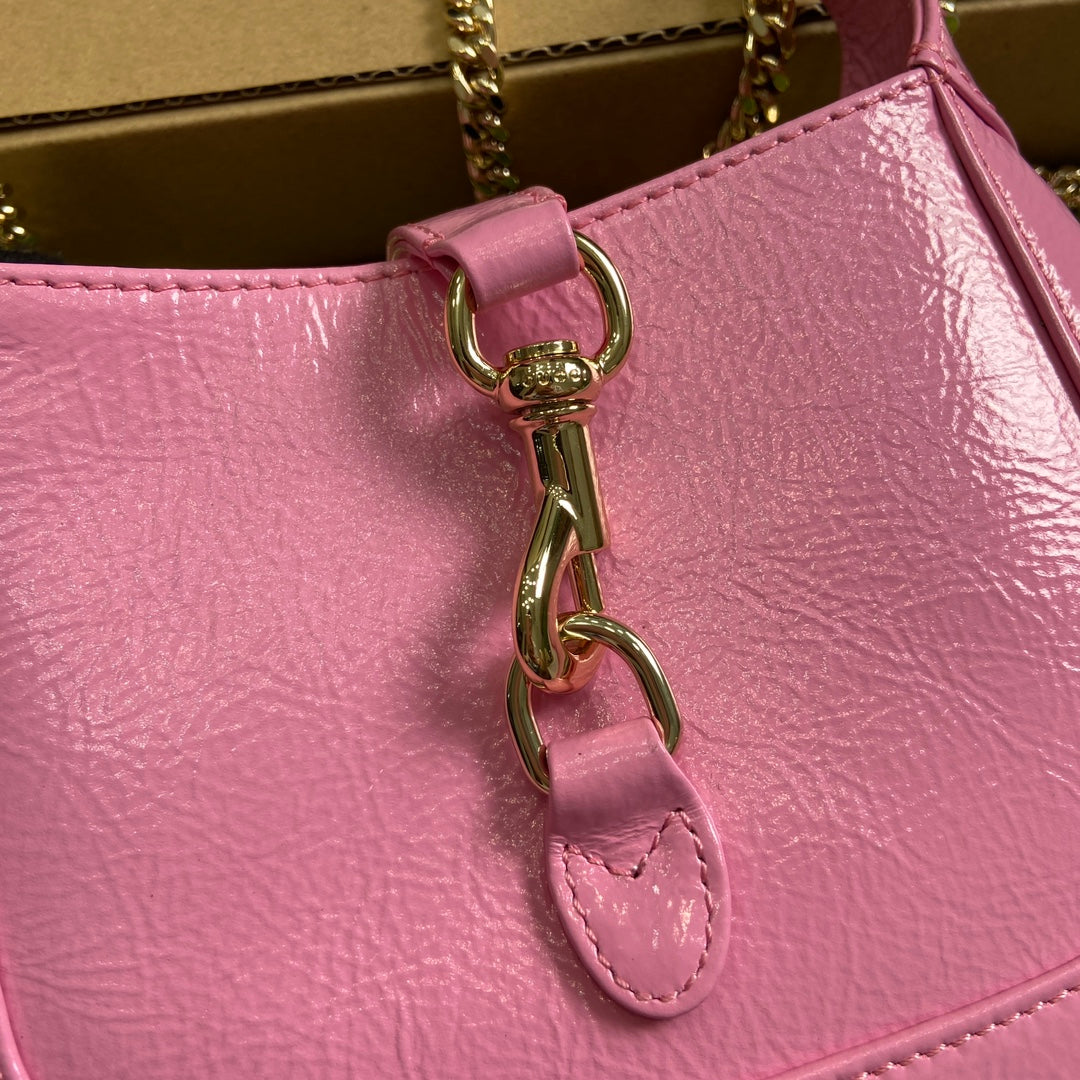 MINI SAC JACKIE NOTTE 19 EN CUIR DE VEAU LAQUÉ ROSE CRAQUELÉ, QUINCAILLERIE DORÉ