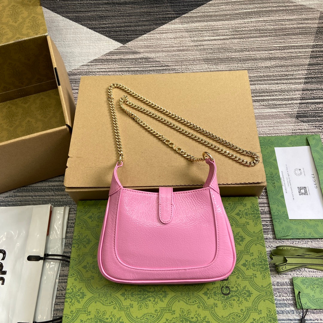 MINI SAC JACKIE NOTTE 19 EN CUIR DE VEAU LAQUÉ ROSE CRAQUELÉ, QUINCAILLERIE DORÉ