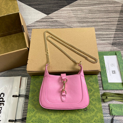 MINI SAC JACKIE NOTTE 19 EN CUIR DE VEAU LAQUÉ ROSE CRAQUELÉ, QUINCAILLERIE DORÉ
