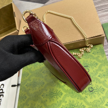 MINI SAC JACKIE NOTTE 19 EN CUIR DE VEAU LAQUÉ CRAQUELÉ VIN ROUGE, QUINCAILLERIE DORÉE