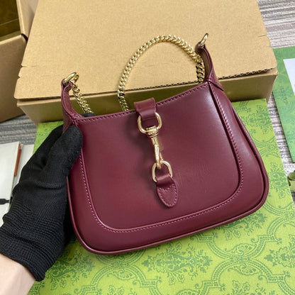 MINI SAC JACKIE NOTTE 19 EN CUIR DE VEAU ROUGE BORDEAUX, QUINCAILLERIE DORÉ